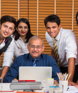 Asian Indian Business People or Corporate culture and Working in the office Concept with Laptop, papers, meetings, presentations and discussions