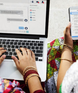 Group of Indian people are using computer laptop